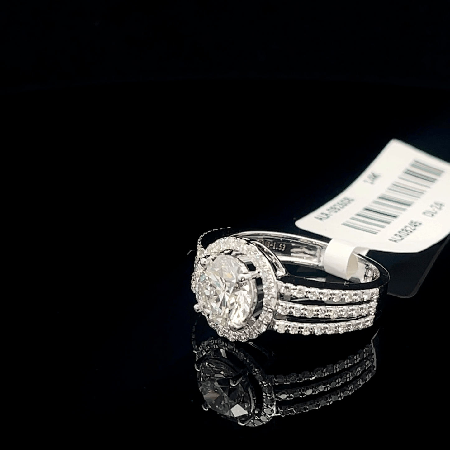 Round Solitaire Diamond Ring with Halo & Triple Split Band