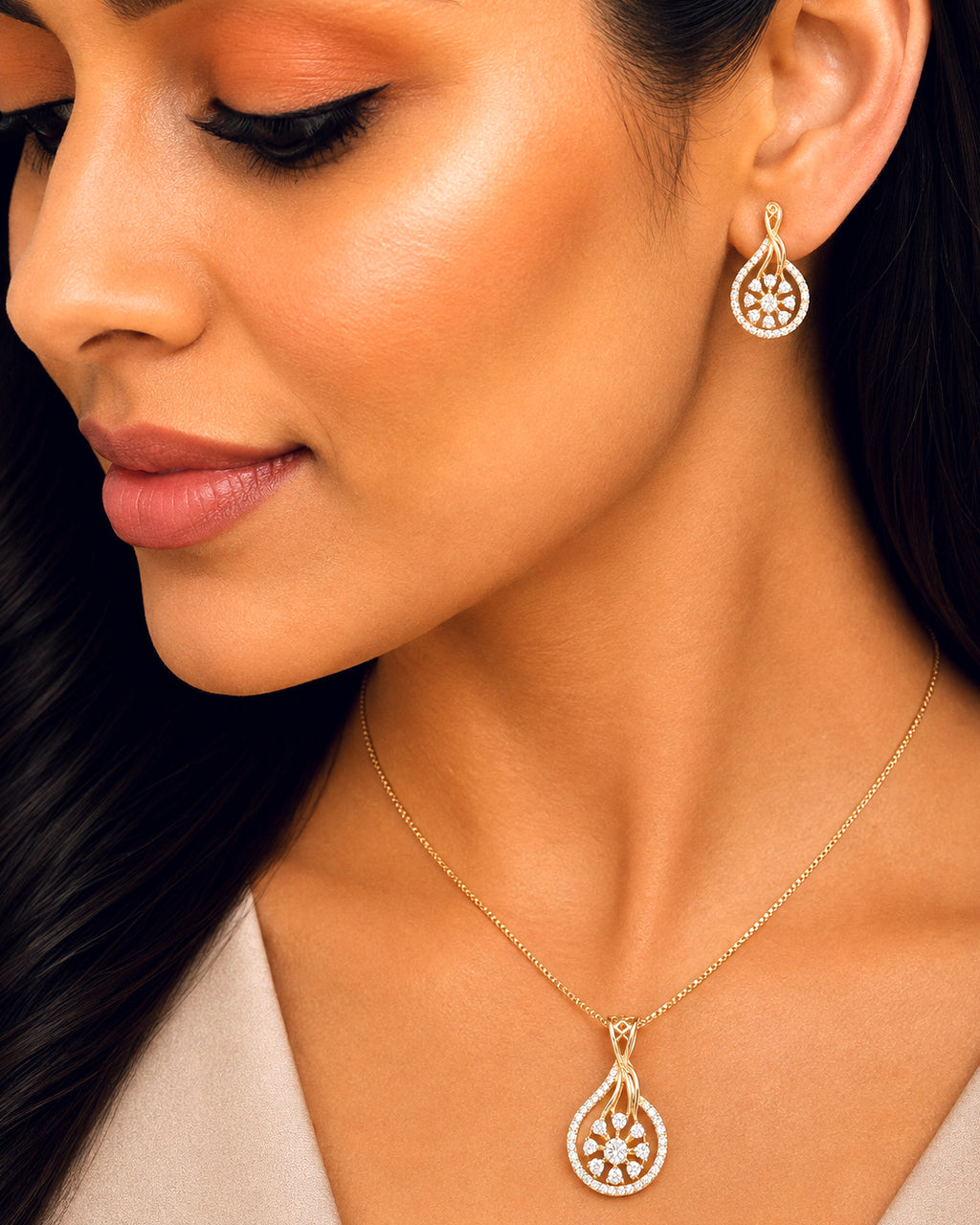 Elegant teardrop pendant with matching stud earrings