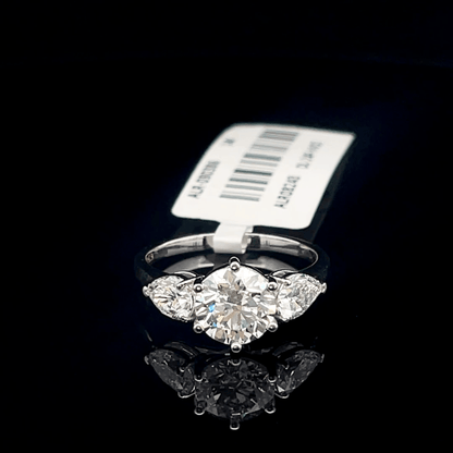 Round and Pear Three Stone Diamond Ring
