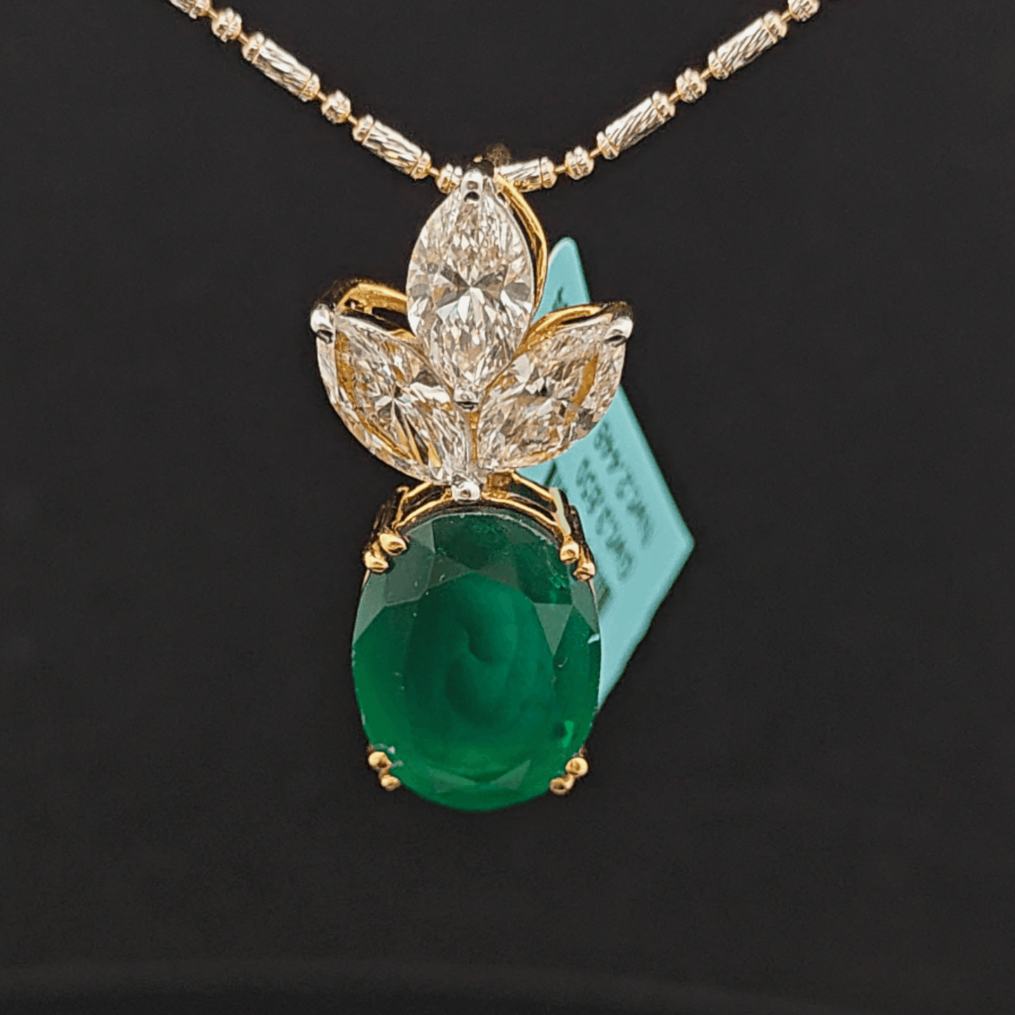 Oval Emerald Diamond Leaf Pendant