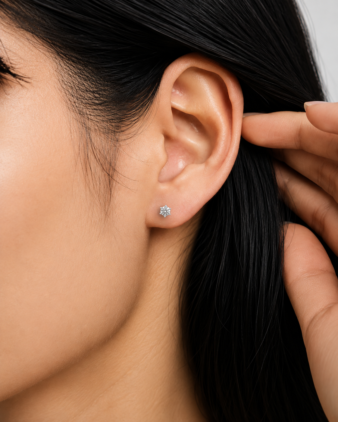 0.705 Carat each solitaire studs