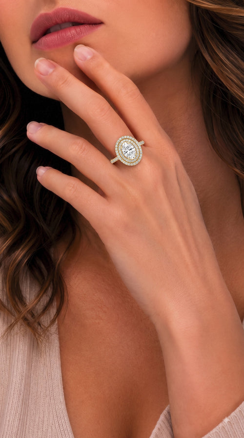 0.70ct Vintage Halo Oval Diamond Ring