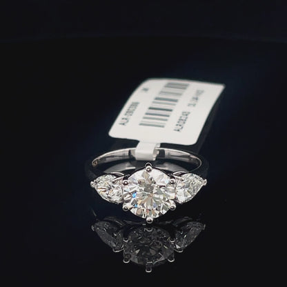 Round and Pear Three Stone Diamond Ring